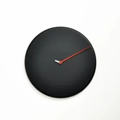 Orologio da muro Less design rotondo in legno