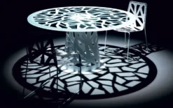 Tavolo rotondo in vetro e metallo Domino
