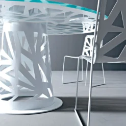 Tavolo rotondo in vetro e metallo Domino